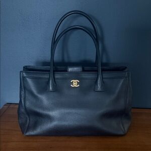 CHANEL Executive Black Leather Tote with Gold Logo